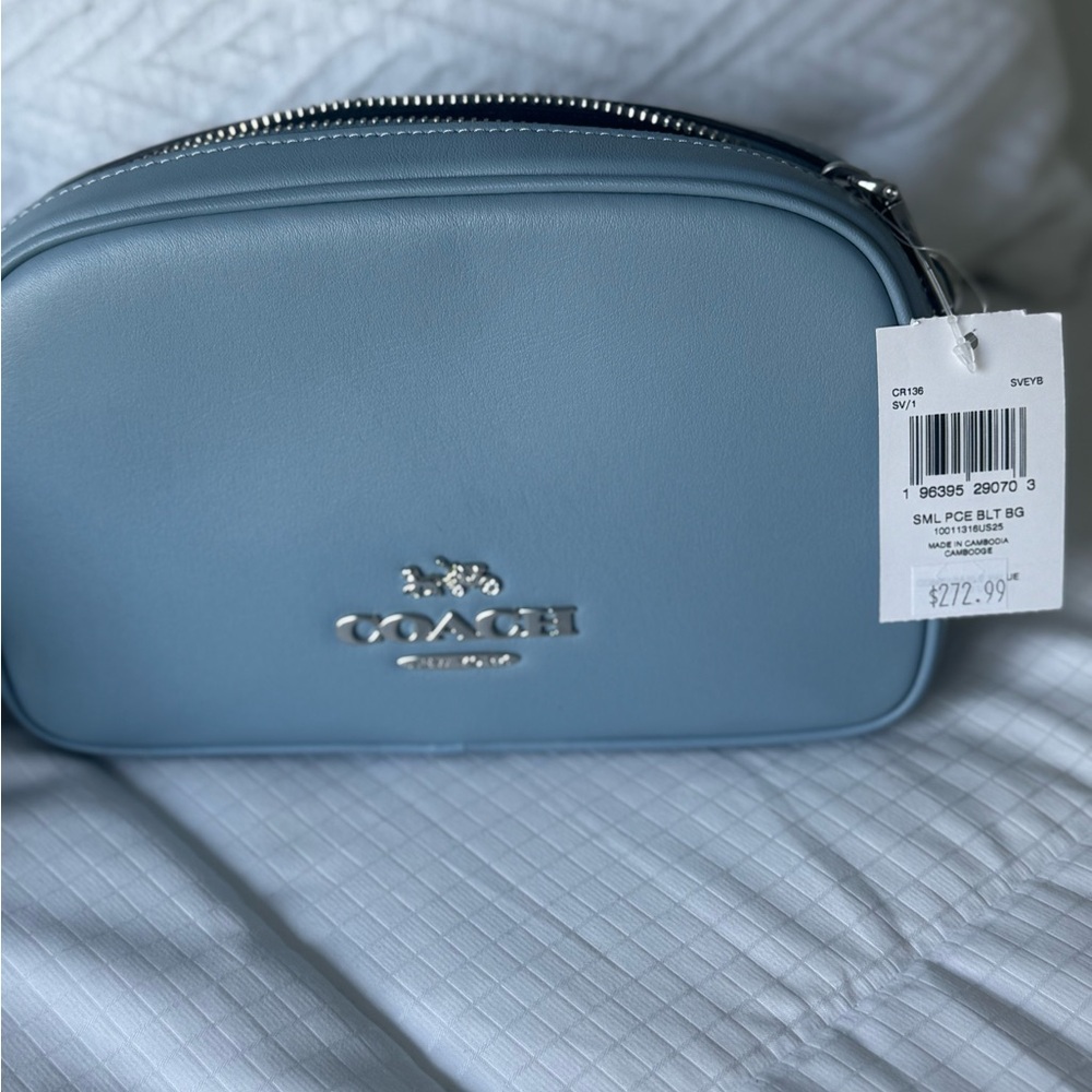 Brand new with tags Coach crossbody. This is an awesome Blue in color.